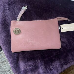 Beautiful Mauve color Clutch Bag
Very soft